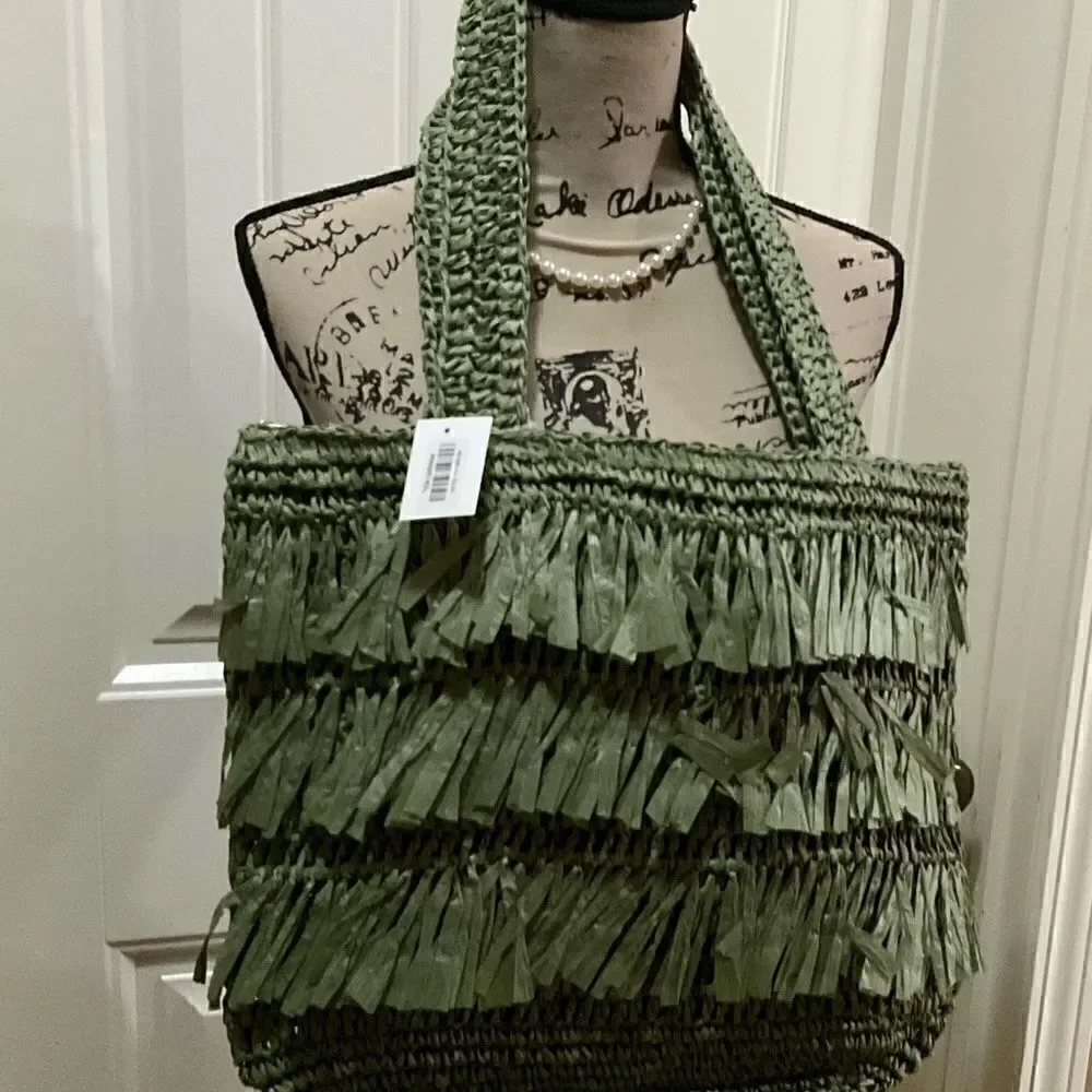 The Last Straw Fringe Straw Tote Bag. In Olive